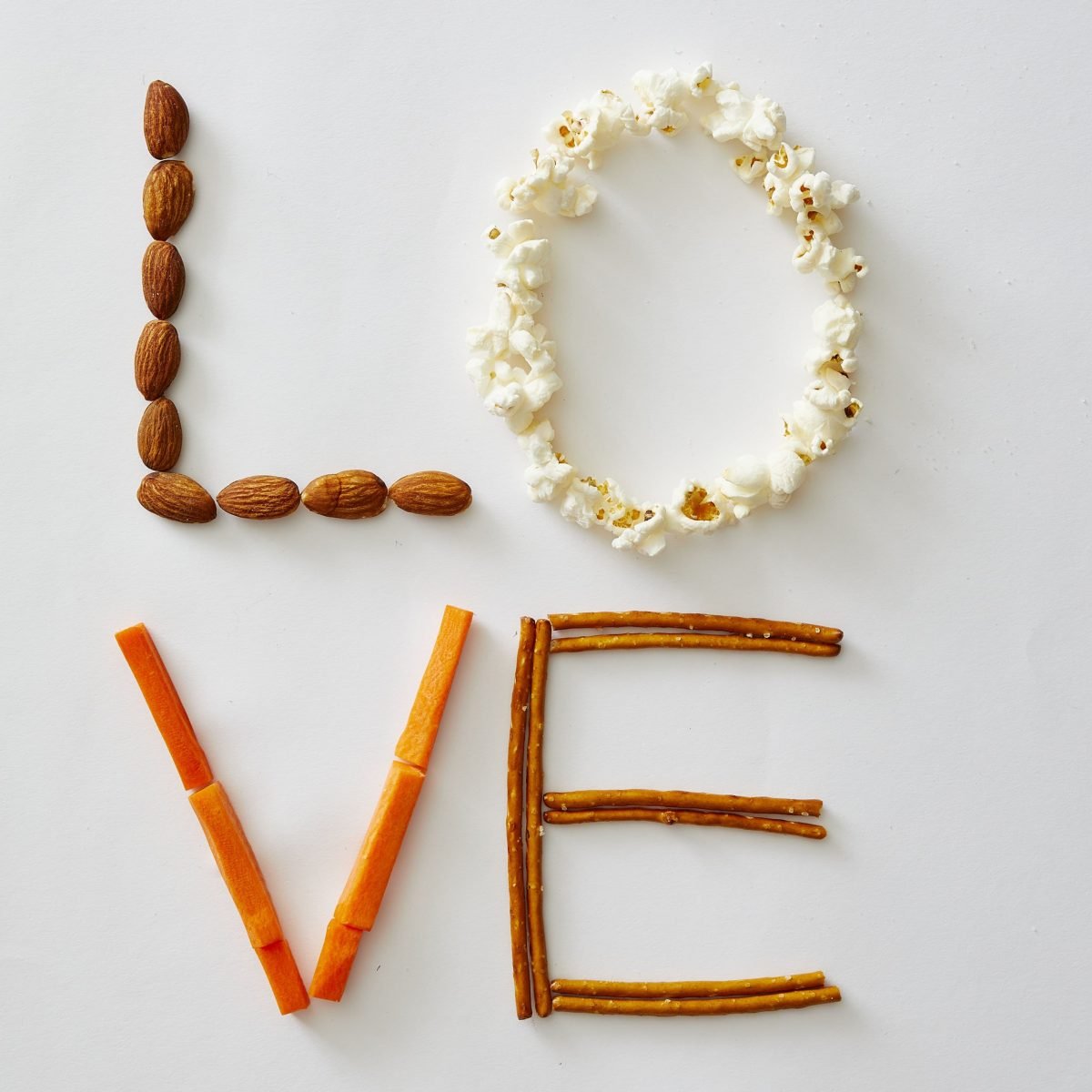 Darcy Miller Designs, L-O-V-E (savory), After school snack, Valentines, healthy treat, pretzels, carrots, popcorn, almonds, nuts, easy valentine, Darcy Miller, DIY